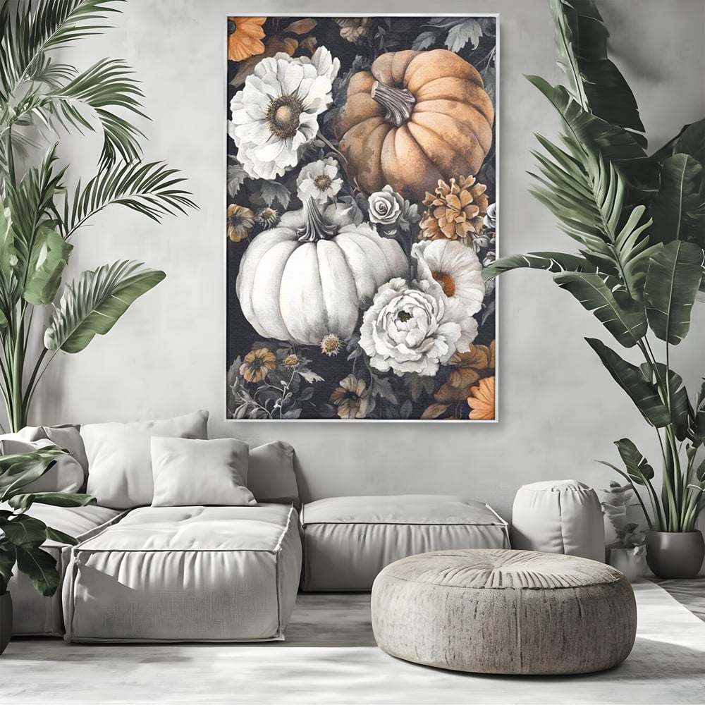 Tablou canvas cu ilustratie cu dovleci si flori de toamna, in rama de aluminiu argintiu, pe perete intr-un living
